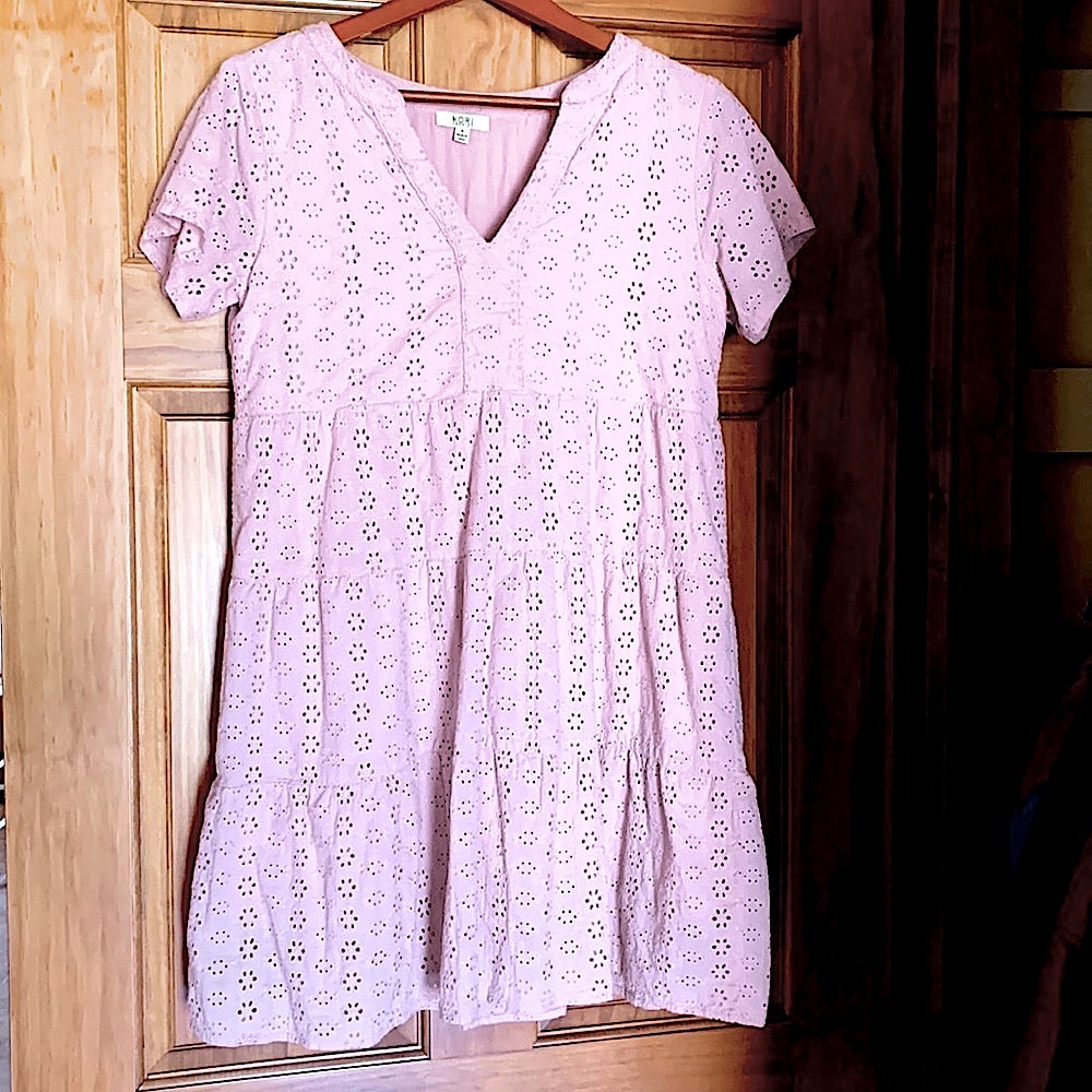 COPY - NWT. Never worn. This eyelet lace dress is ready to wear any time of the…